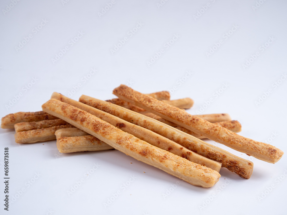 Cheese Sprinkle Stick Cookies are neatly presented and isolated against a white background. Cheese Sprinkle Stick Cookies are neatly presented and isolated against a white background.