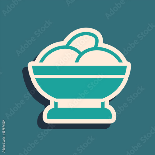 Green Varenyky in a bowl icon isolated on green background. Pierogi, varenyky, dumpling, pelmeni, ravioli. Traditional Ukrainian food. Long shadow style. Vector