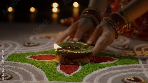 Clay diya lamps lit during diwali celebration, Diwali, or Deepavali, is India's biggest and most important holiday.