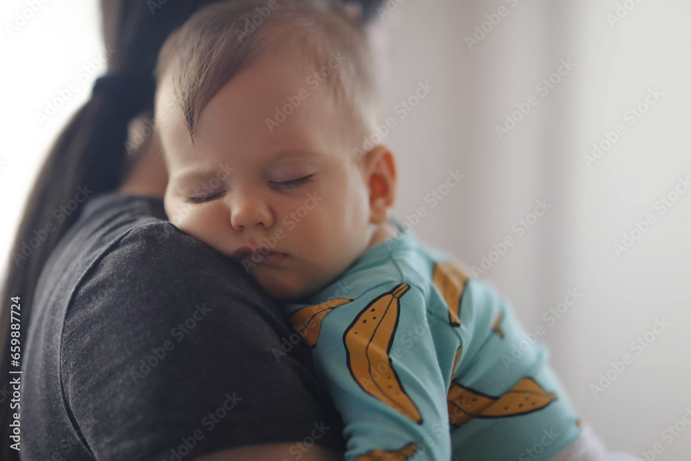 Baby Bliss: Peaceful Slumber in Mother's Embrace Baby Bliss: Peaceful Slumber in Mother's Embrace