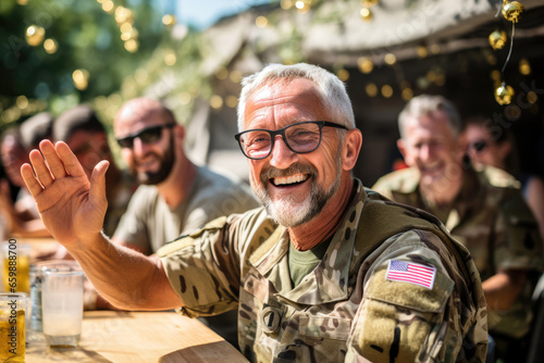 Retired happy military senior, smiling war veteran on a sunny day in a street cafe together with friends. Lifestyles, emotional celebrating Independence Day, Remembrance Day photo