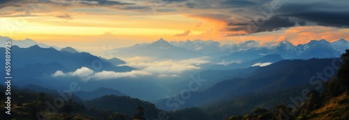 Sunset over the rugged beauty of a high mountain range, a mesmerizing view