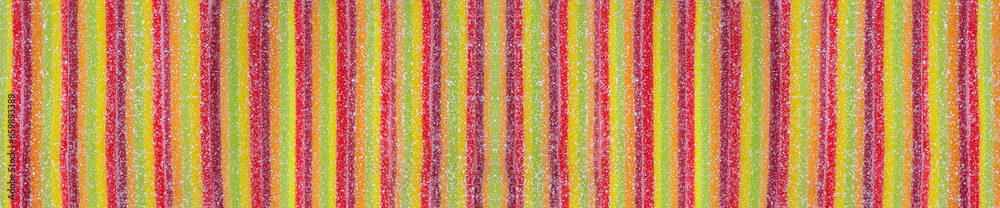 Colorful jelly candies strips in sugar sprinkles