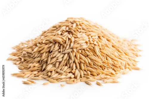 Small pile of grain on a white background. Cereals