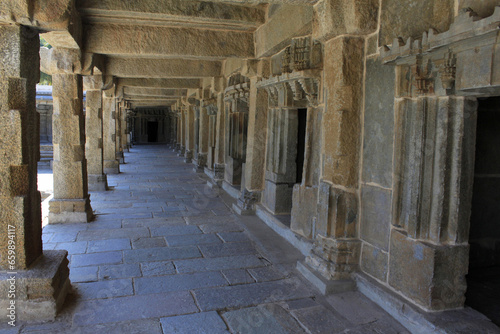 Colonnade of the cloistered corridor, at Chennakesava temple, Hoysala Architecture at Somnathpur, Karnataka, India photo