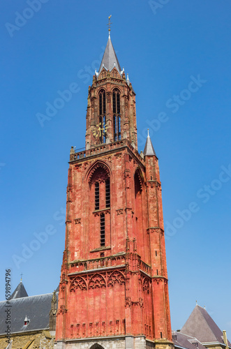 Red tower of the St. Jan church in Maastricht, Netherlands