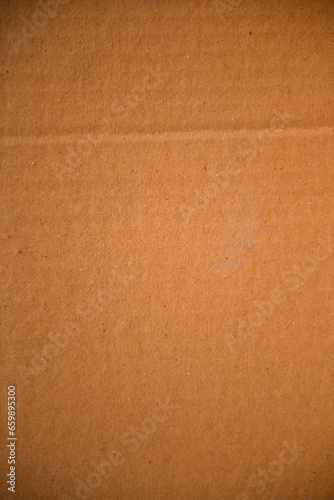 Brown recycled paper texture background.Cardboard surface from a paper box