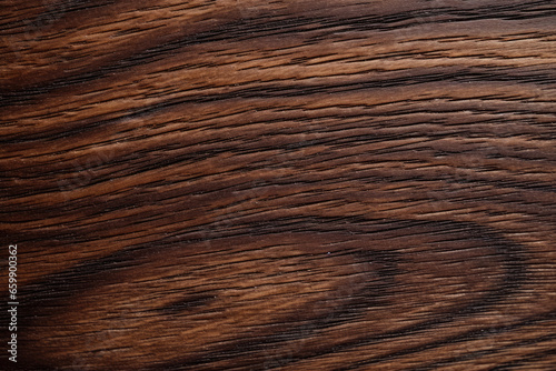A Captivating Display of Richness and Depth: The Elegant Wenge Wood Texture, an Intricate and Striking African Hardwood with Sustainable and Versatile Qualities for Luxurious Interior Design.
