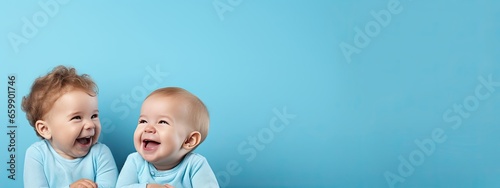 Happy cheerful laughing young baby . With a simple background color for copy text space, wide screen for ads and banners. Generative AI