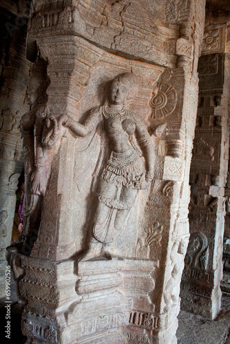 Intricately sculpted pillars inside the Veerabhadra Swamy Temple, Lepakshi , Andhra Pradesh, India photo