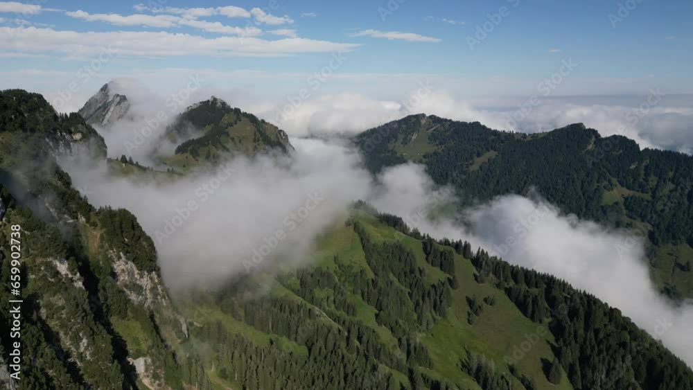 Aerial View of Mystical Mountains: Capturing the Beauty of Green Peaks and Clouds Aerial View of Mystical Mountains: Capturing the Beauty of Green Peaks and Clouds