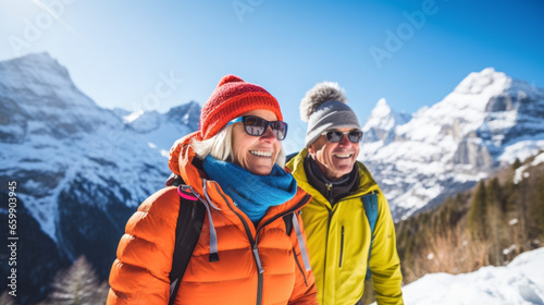 Senior couple having fun together during winter vacation in the mountains - Model by AI generative 