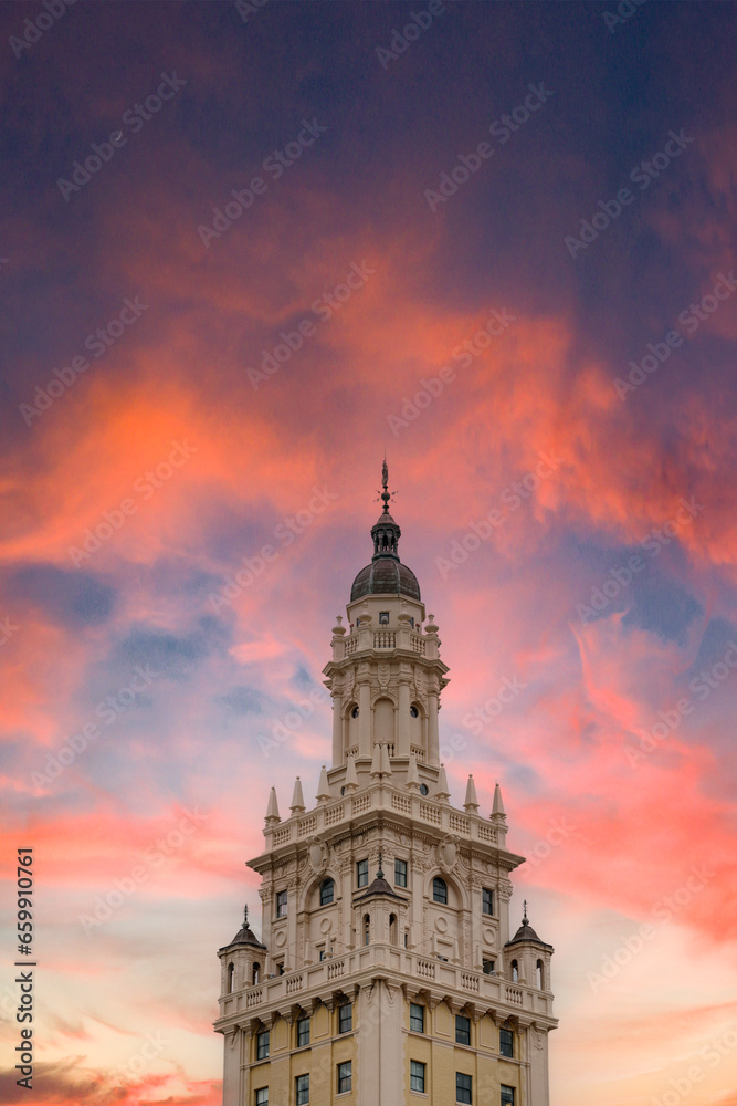Fototapeta premium Stock image historic gothic building on fire sunset sky