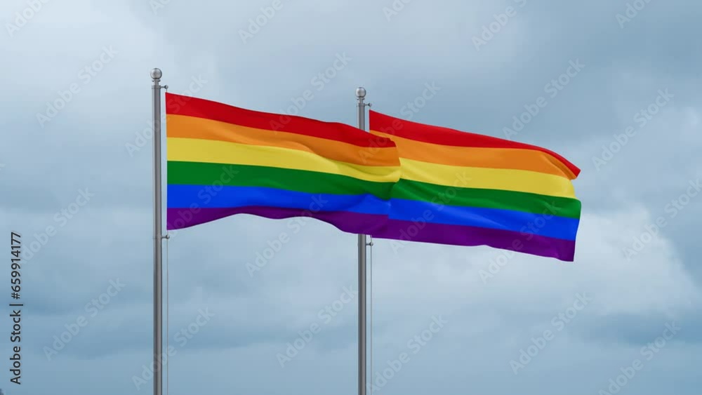 Two LGBT movement also Gay Pride flag waving in the wind cycle looped video, tolerance conception in country