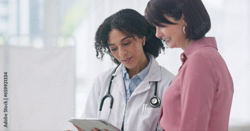 Healthcare, tablet and a doctor talking to a woman patient in the hospital for medical, consulting or insurance. Smile, medicine or conversation with a person in the clinic with a health professional Healthcare, tablet and a doctor talking to a woman patient in the hospital for medical, consulting or insurance. Smile, medicine or conversation with a person in the clinic with a health professional