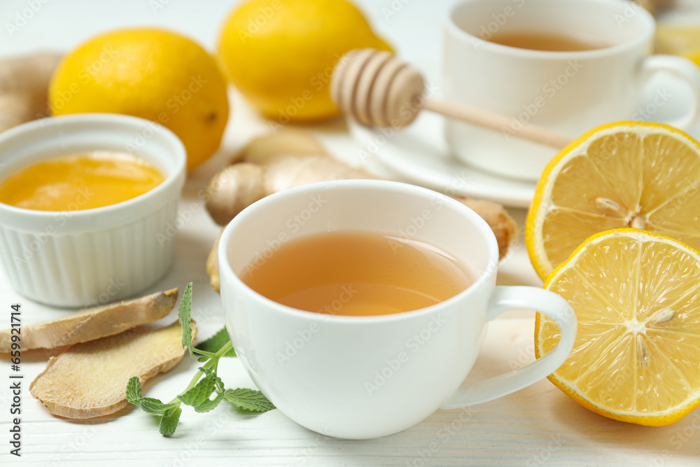 Cold treatment, healthcare concept - tea with ginger Cold treatment, healthcare concept - tea with ginger