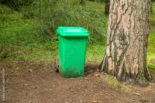 Trash bin in nature. © andranik123