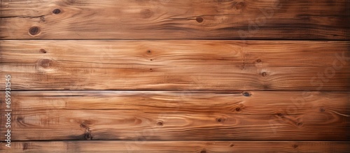 Close up of a natural wood texture with a vintage grunge brown surface suitable for backgrounds or furniture