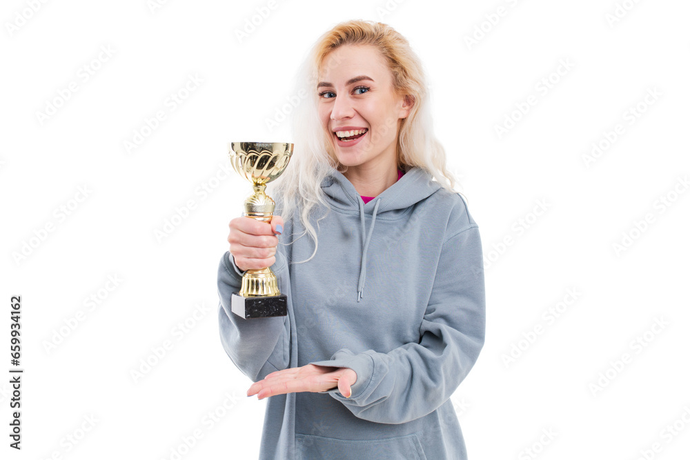 A young woman poses with a golden cup on a white background. Winning competitions A young woman poses with a golden cup on a white background. Winning competitions