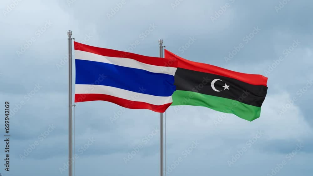 Libya and Thailand flag waving together on cloudy sky, endless seamless loop, two country cooperation concept Libya and Thailand flag waving together on cloudy sky, endless seamless loop, two country cooperation concept