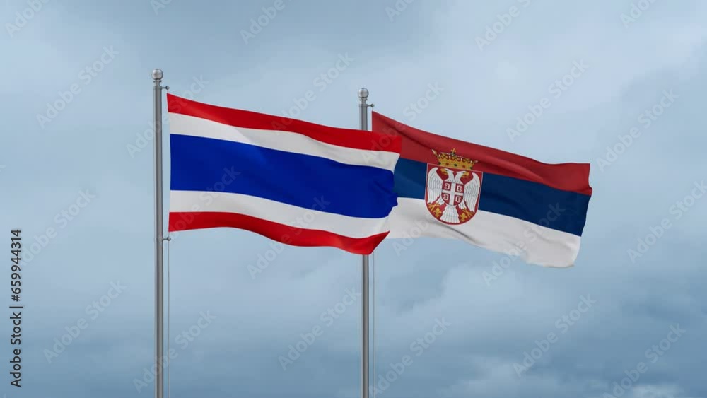 Republic of Serbia and Thailand flag waving together on cloudy sky, endless seamless loop, two country cooperation concept Republic of Serbia and Thailand flag waving together on cloudy sky, endless seamless loop, two country cooperation concept
