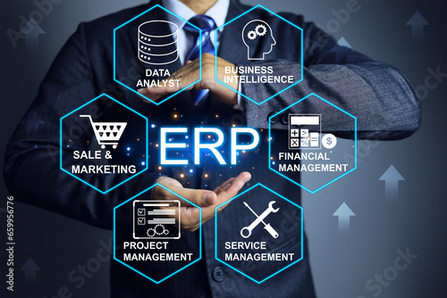 Businessman with ERP software, Enterprise Resource Planning concept. Providing advanced capabilities to automate operational processes, react real time, automatic updates gain a competitive advantage