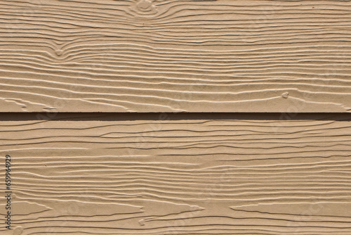 Close-up shot of the fake wood panel surface.