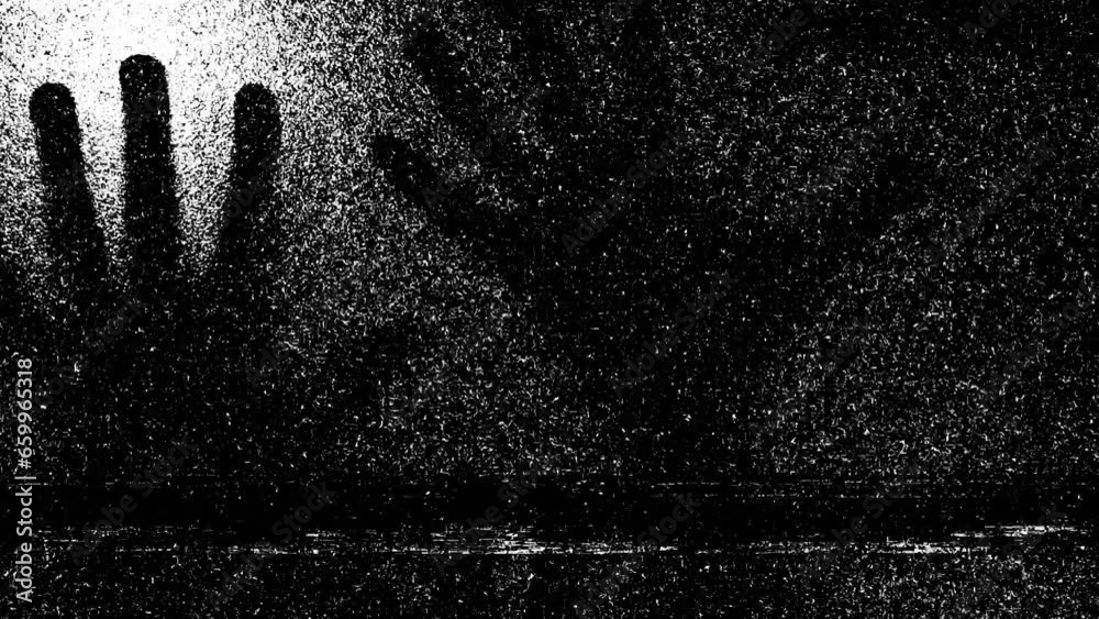 Silhouette of a men's hands on glass scratching and static tv black and white noise, scary movie tv screen noise