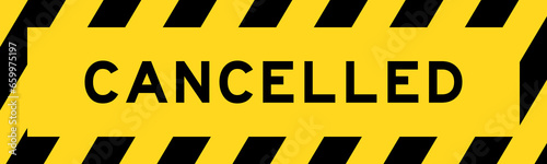 Yellow and black color with line striped label banner with word cancelled