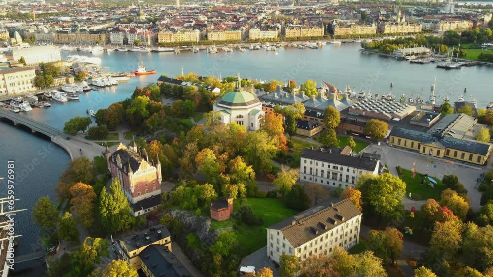 View over the inlet towards the central part of Stockholm city, Sweden with colorful leaves on the trees. 