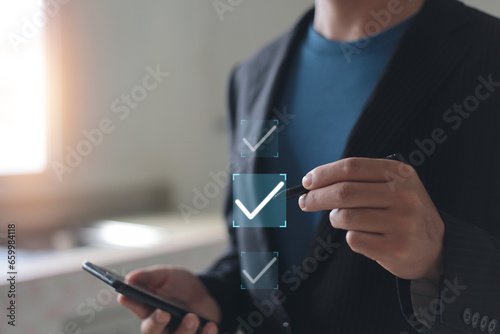 Business performance monitoring concept, businessman using smartphone digital form checklist,
