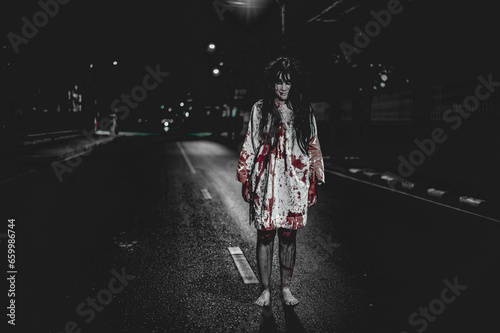 Horror woman concept,Ghost on the road in the city,A vengeful spirit on the street of the town,Halloween festival,Make up ghost face