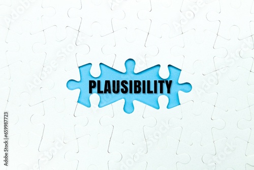 white puzzle and the word plausibility in the middle. the concept of reliability. trusted concept