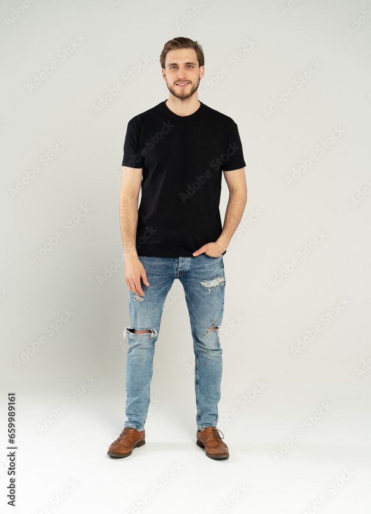 Full length portrait of happy handsome young man isolated on white background. Full length portrait of happy handsome young man isolated on white background.
