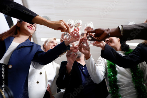 Photography Happy smiling man and woman celebrating Christmas, drinking champagne, partying
