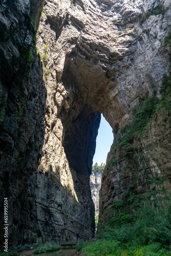 The 'Azure Dragon' Qinglong Bridges are situated within Wulong Karst National Geology Park in Chongqing, China