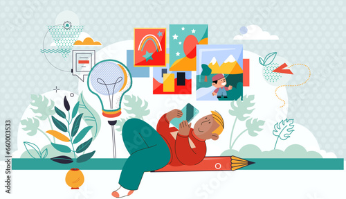 Creative ideas and technologies concept. Smiling boy lying with smartphone with flying ahead ideas and creative things. Child playing game on phone. Watching online drawing lesson, looking at pictures
