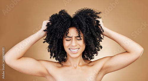 Woman afro, studio hair problem and grooming care mistake, shampoo allergic reaction or texture crisis, risk or fail. Spa salon hairstyle, keratin and face of person stress on brown background