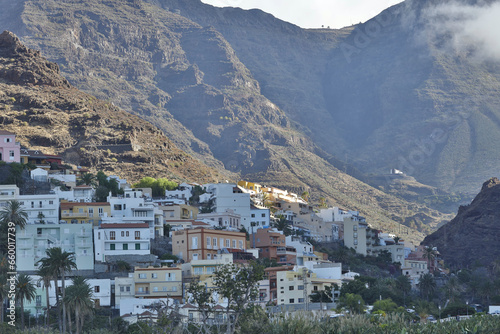 La Gomera, Spain. Onshore view of the coastline of Valle Gran Rey with the small town of La Calera. photo