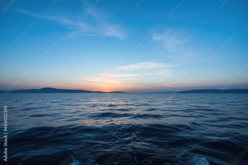 Fototapeta premium distant land viewed from a boat at sea