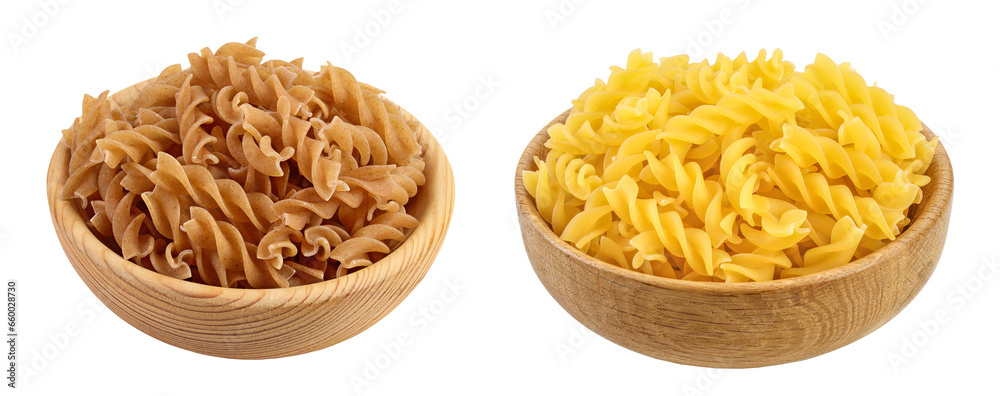 Wolegrain fusilli pasta from durum wheat in wooden bowl isolated on white background with full depth of field. Wolegrain fusilli pasta from durum wheat in wooden bowl isolated on white background with full depth of field.