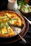 still life of quiche made with eggs, asparagus, paprika and thyme