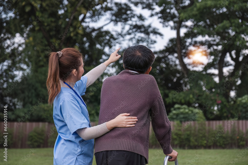 Asian woman caregiver helping senior man walking. Nurse assisting he old man patient at nursing home. Senior man using walker being helped by nurse at home. Elderly patient care and health lifestyle Asian woman caregiver helping senior man walking. Nurse assisting he old man patient at nursing home. Senior man using walker being helped by nurse at home. Elderly patient care and health lifestyle