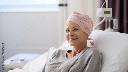 Portrait of the patient woman after chemotherapy female cancer patient wearing head scarf