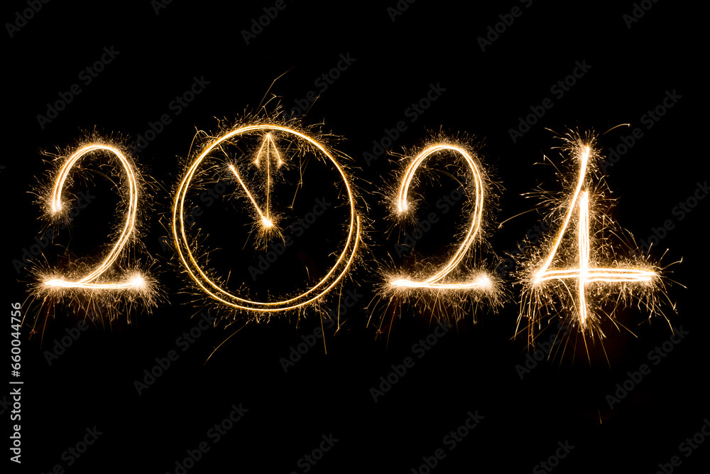 Happy New Year 2024. Sparkling burning text Happy New Year 2024 isolated on black background. Happy New Year 2024. Sparkling burning text Happy New Year 2024 isolated on black background.