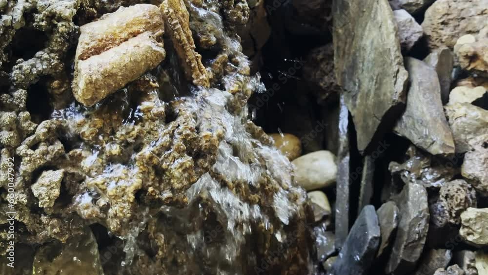 Waterfall Seeping through small Stones Waterfall Seeping through small Stones