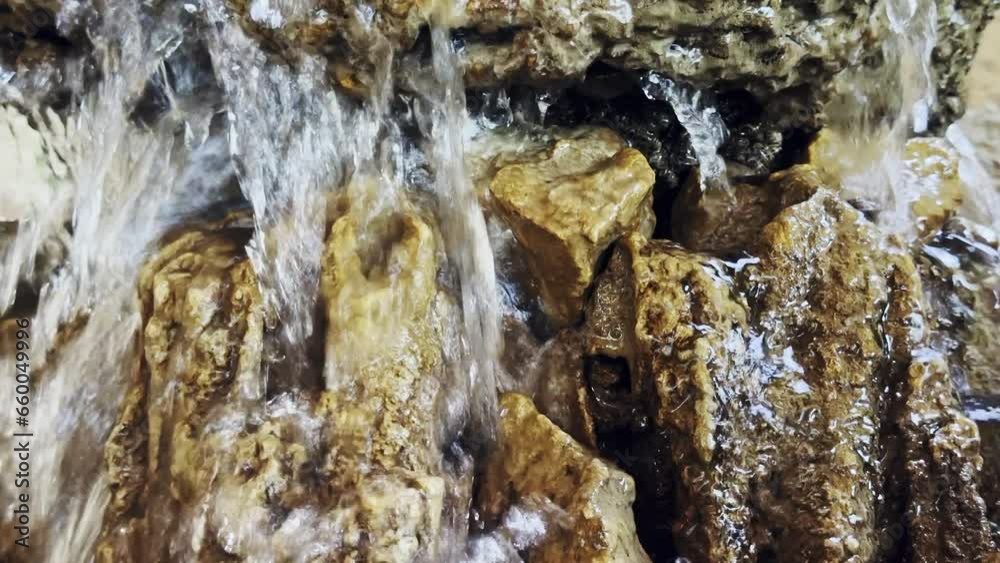 Waterfall Seeping through small Stones Waterfall Seeping through small Stones