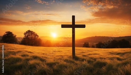 Fotografering Ascension day concept: The cross on meadow autumn sunrise background