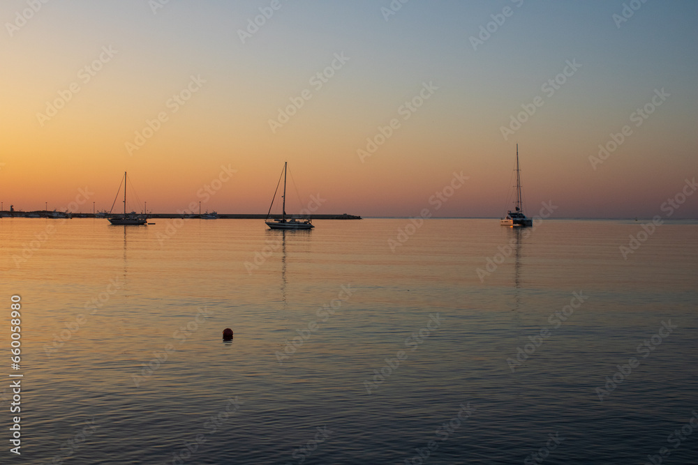Sail boats at dawn in Sicily Sail boats at dawn in Sicily