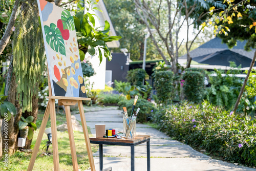 Female Artist Creates a Masterpiece in Public Garden © MIND AND I